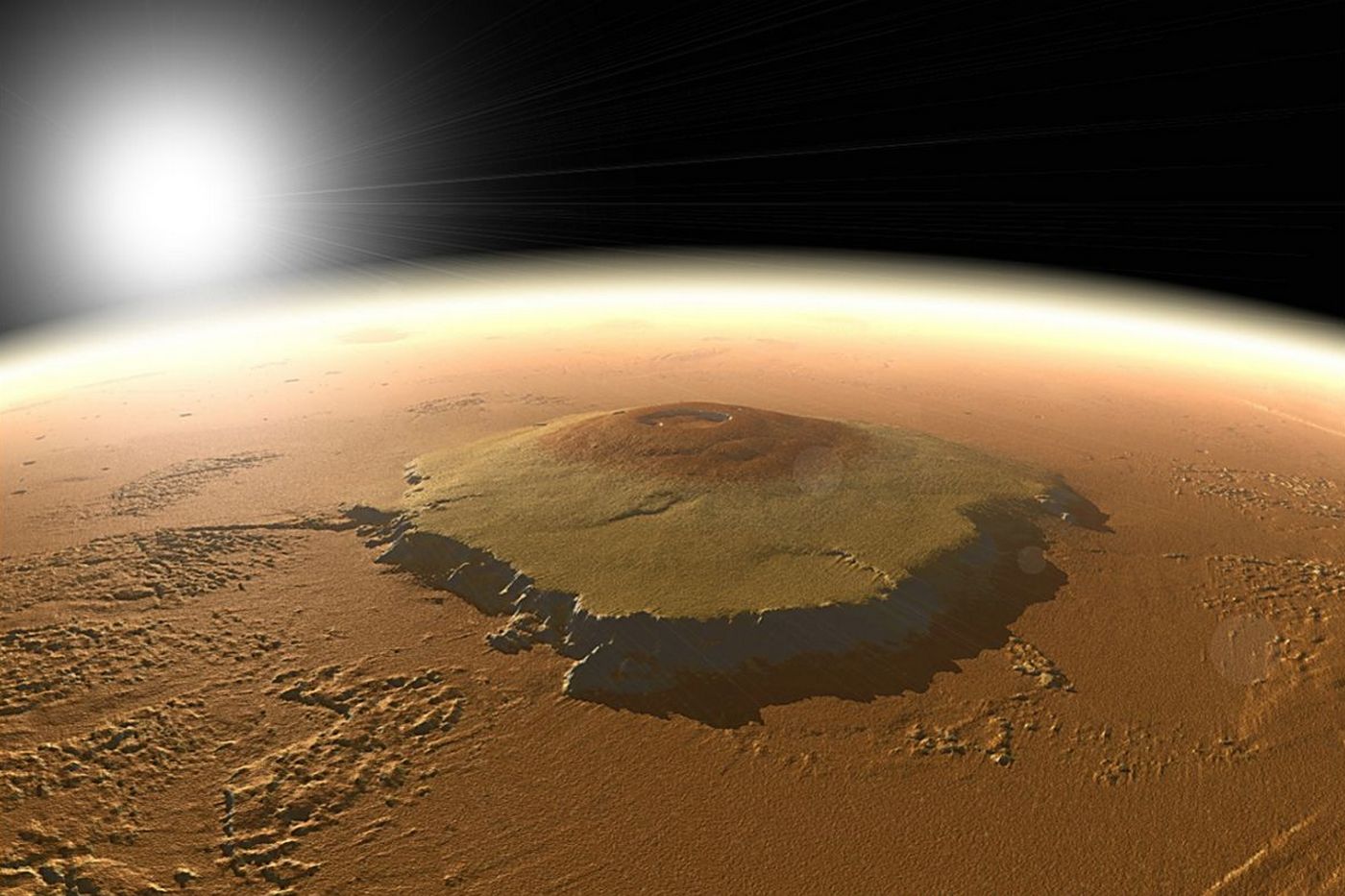 Olympus Mons: The Highest Volcano on Mars and its Connection to an Ancient Ocean